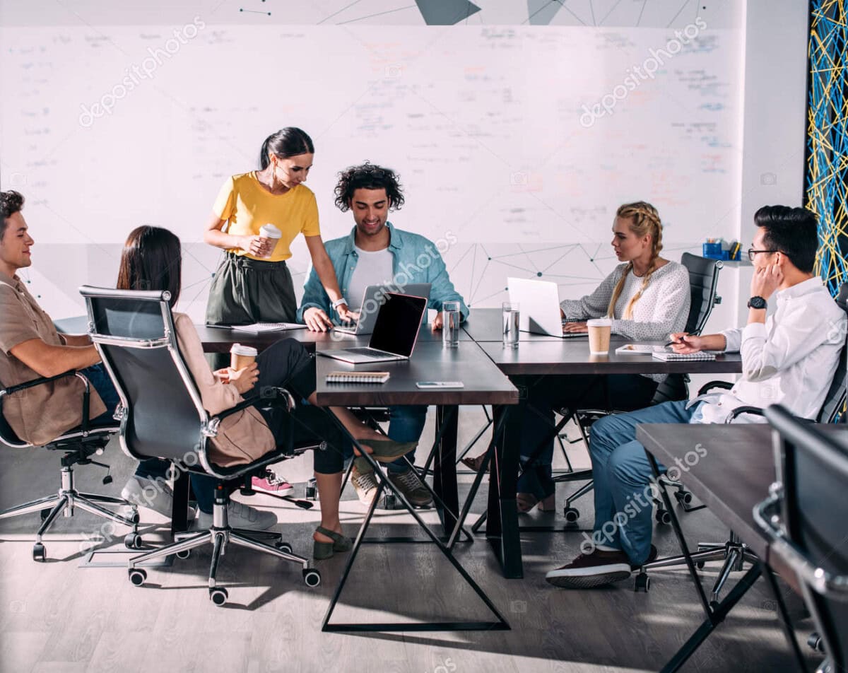 depositphotos 197033552 stock photo multiethnic business partners having meeting